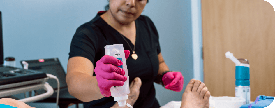 Arterial Doppler Ultrasound: A female doctor performing the procedure.