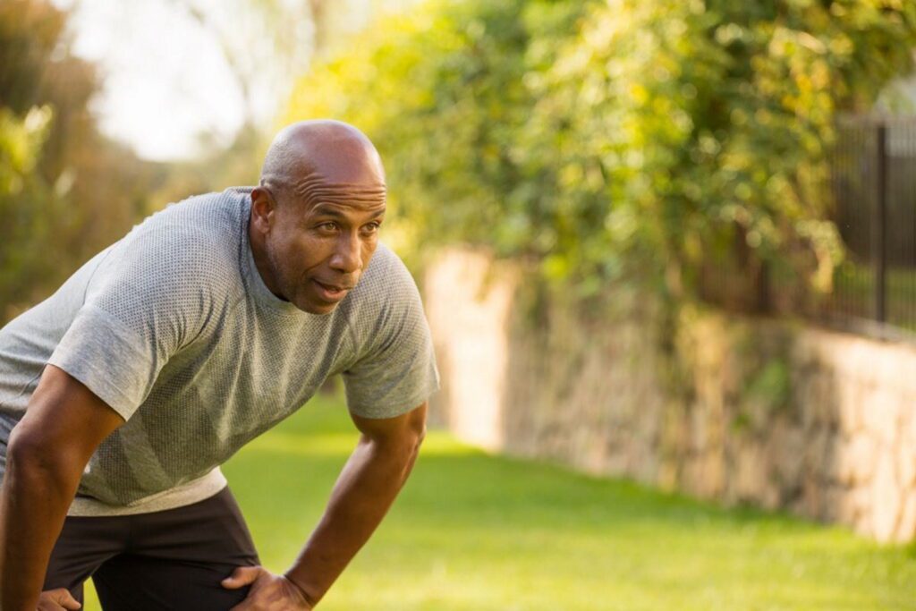 A man experiencing lower leg tingling while feeling tired