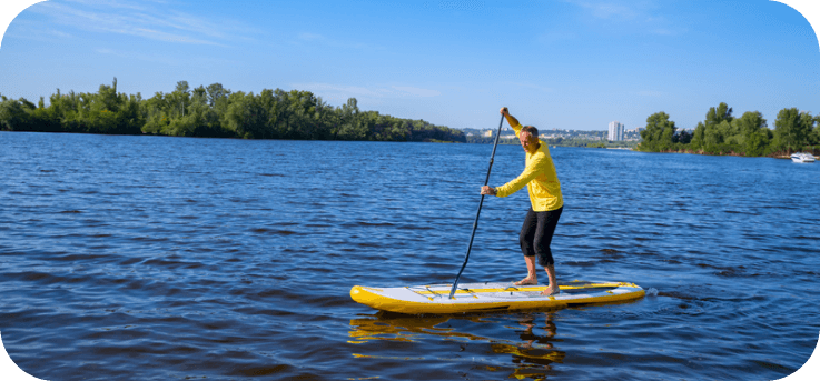 older man kayaking