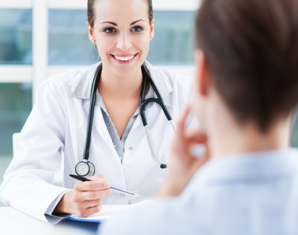 A female doctor is engaging in a conversation with her patient, discussing their health, Sclerotherapy