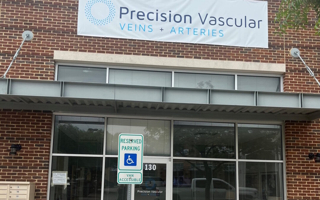 A storefront image of Precision Vascular, a vein and artery clinic.