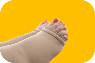 person's foot wearing a beige open-toe compression stocking or sleeve