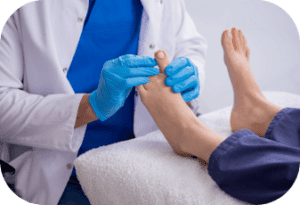 A podiatrist carefully examining a patient's foot.