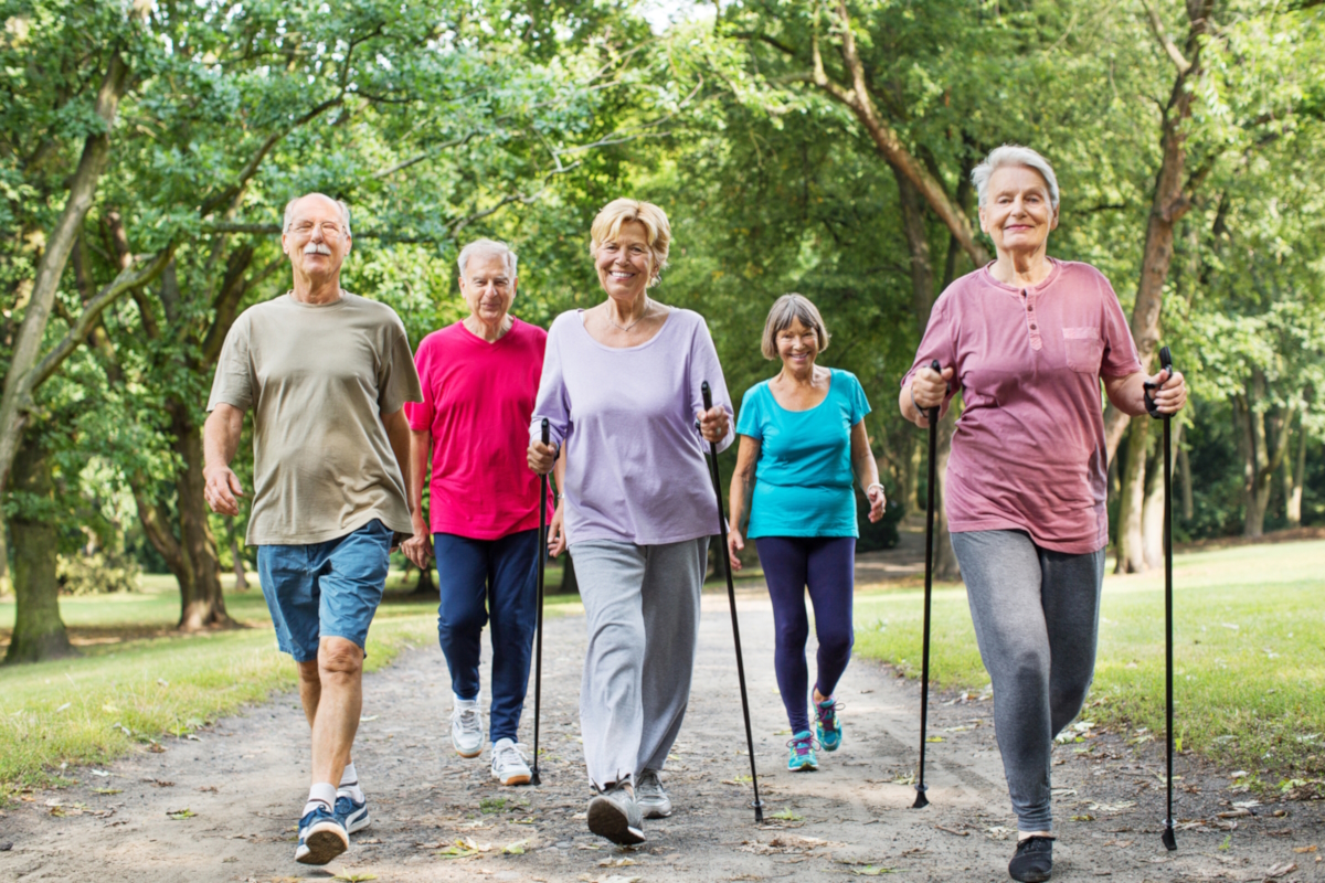 Group of seniors walking in park