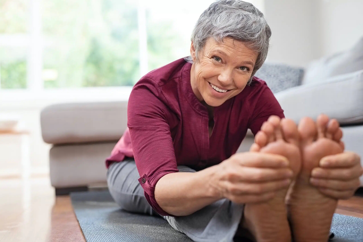 chronic foot pain exercises stretching mature woman